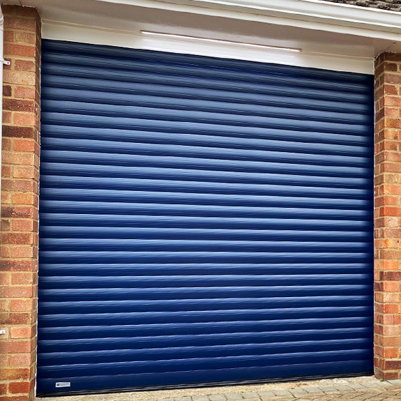 Insulated Electric Roller Door Price Guide from The Garage Door Centre